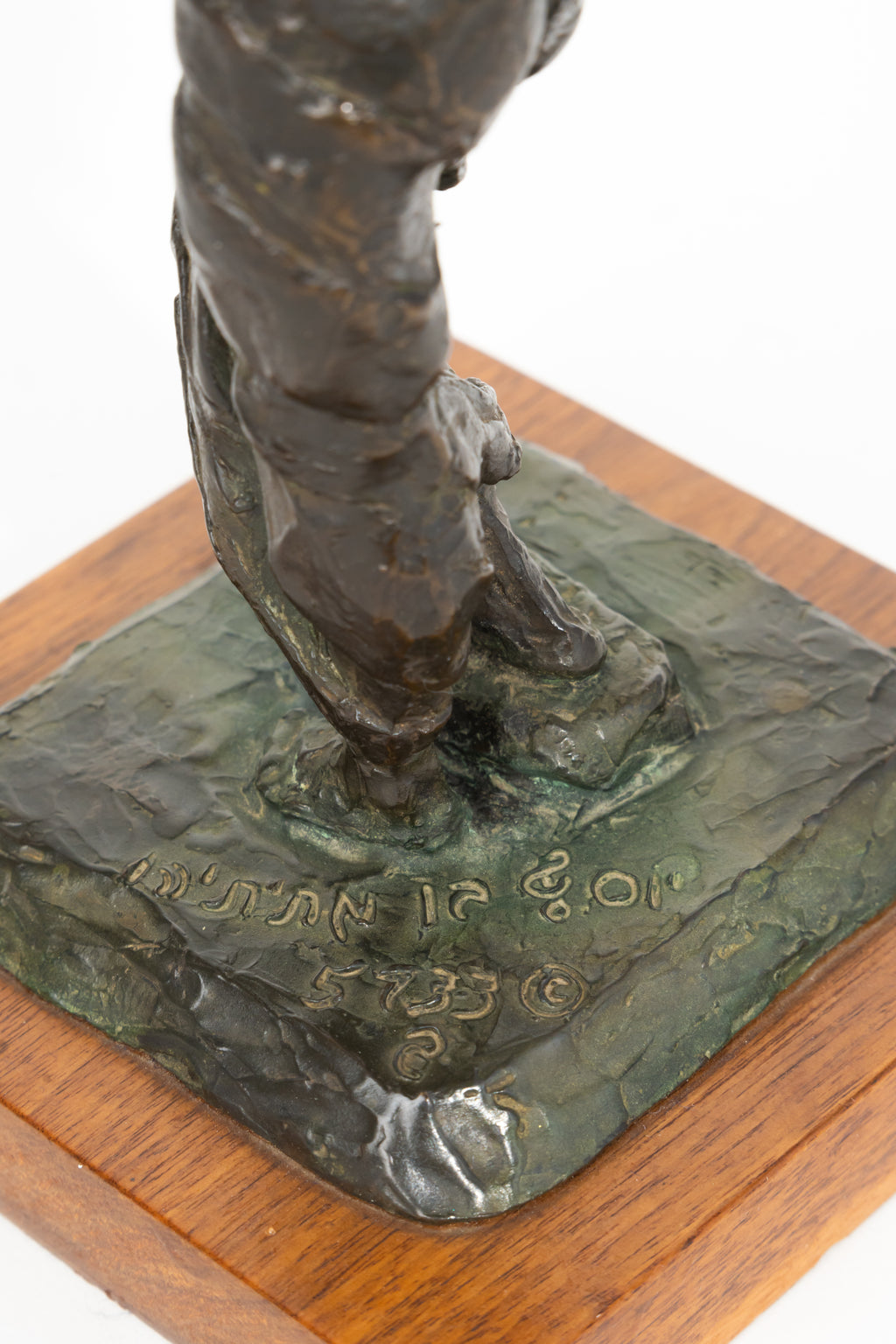 A Judaica Patinated Bronze Figure Of Lady Pointing on Holy Book