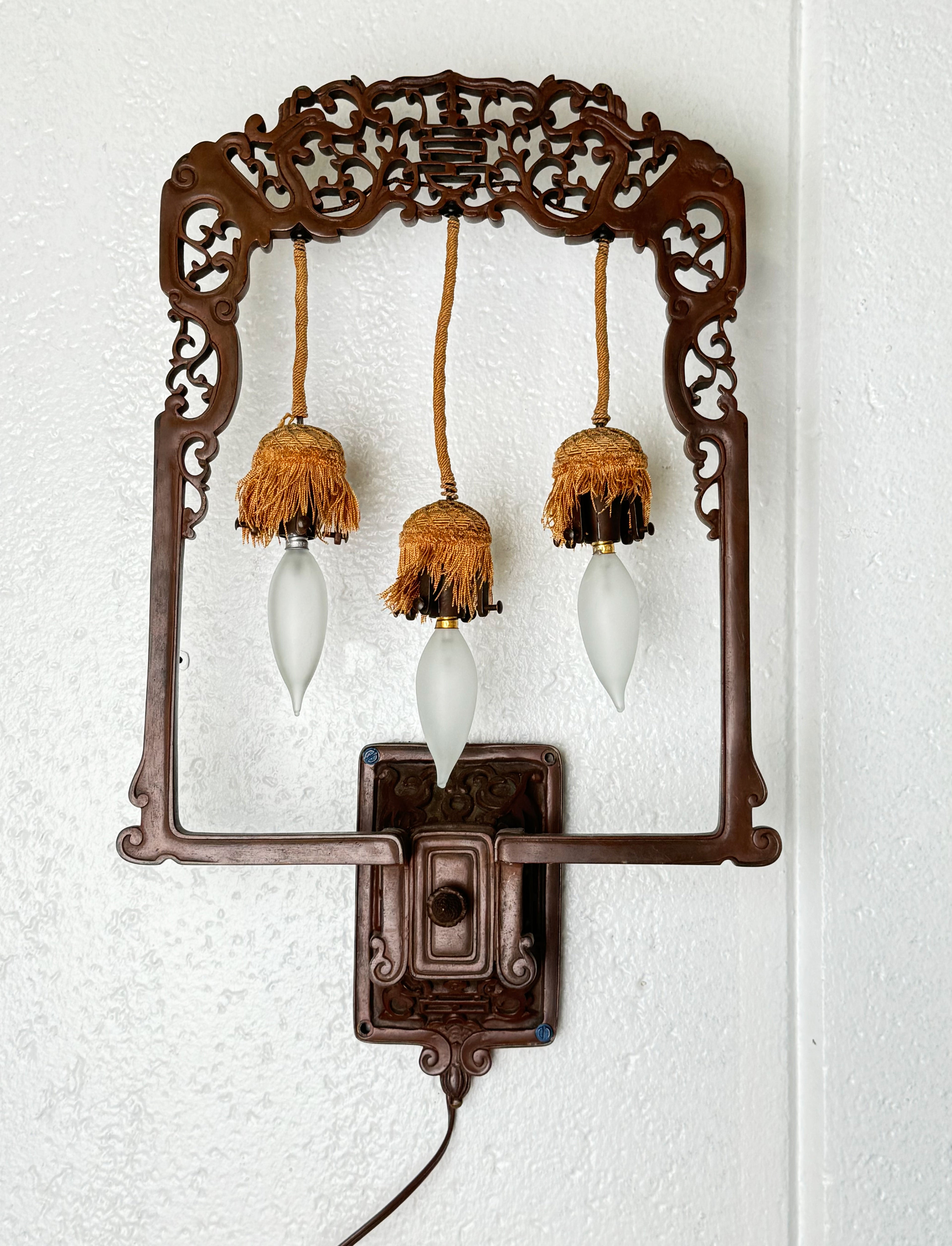 A Pair Of 19th Century French Chinoiserie Patinated Bronze Sconces