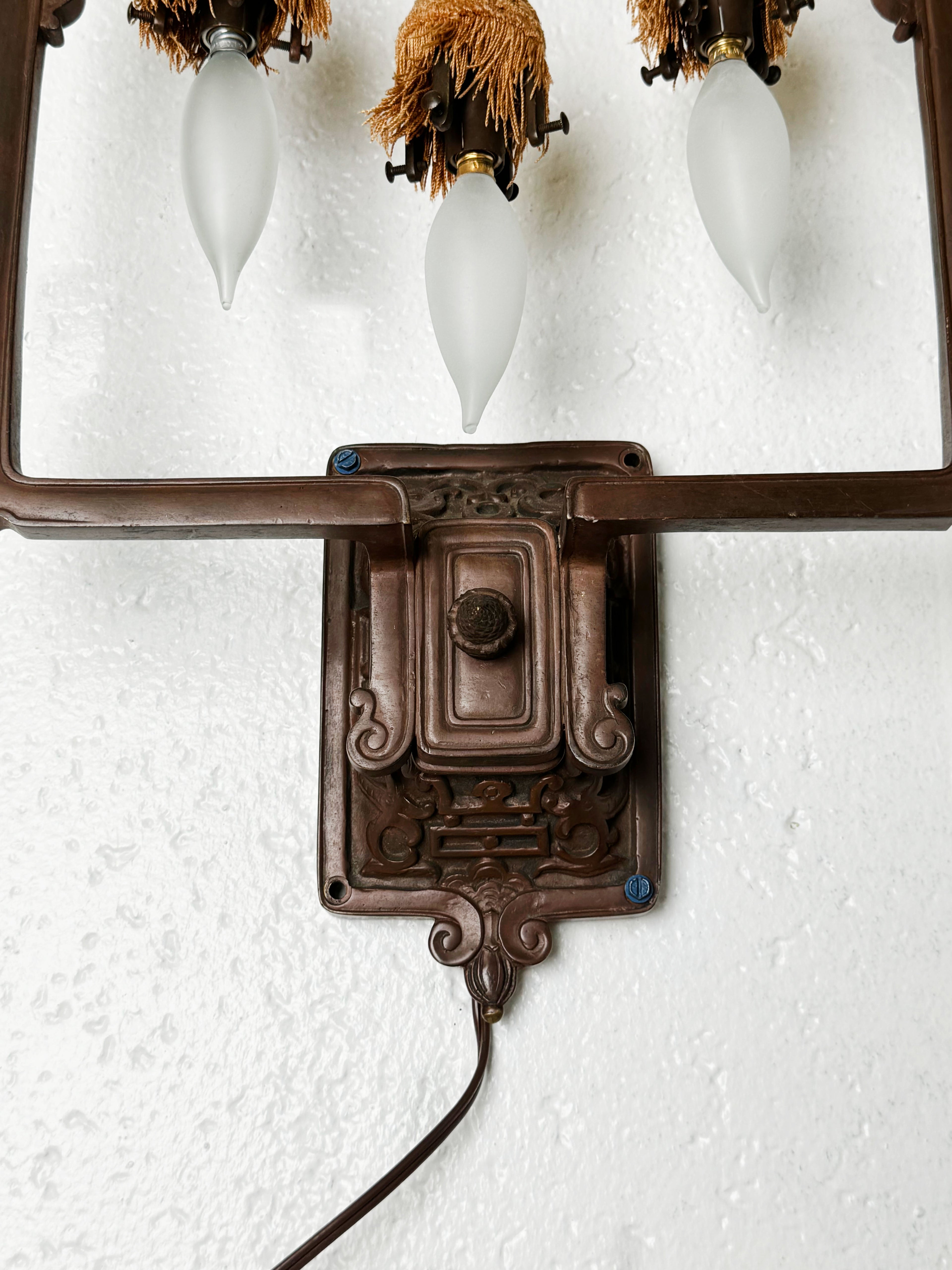 A Pair Of 19th Century French Chinoiserie Patinated Bronze Sconces