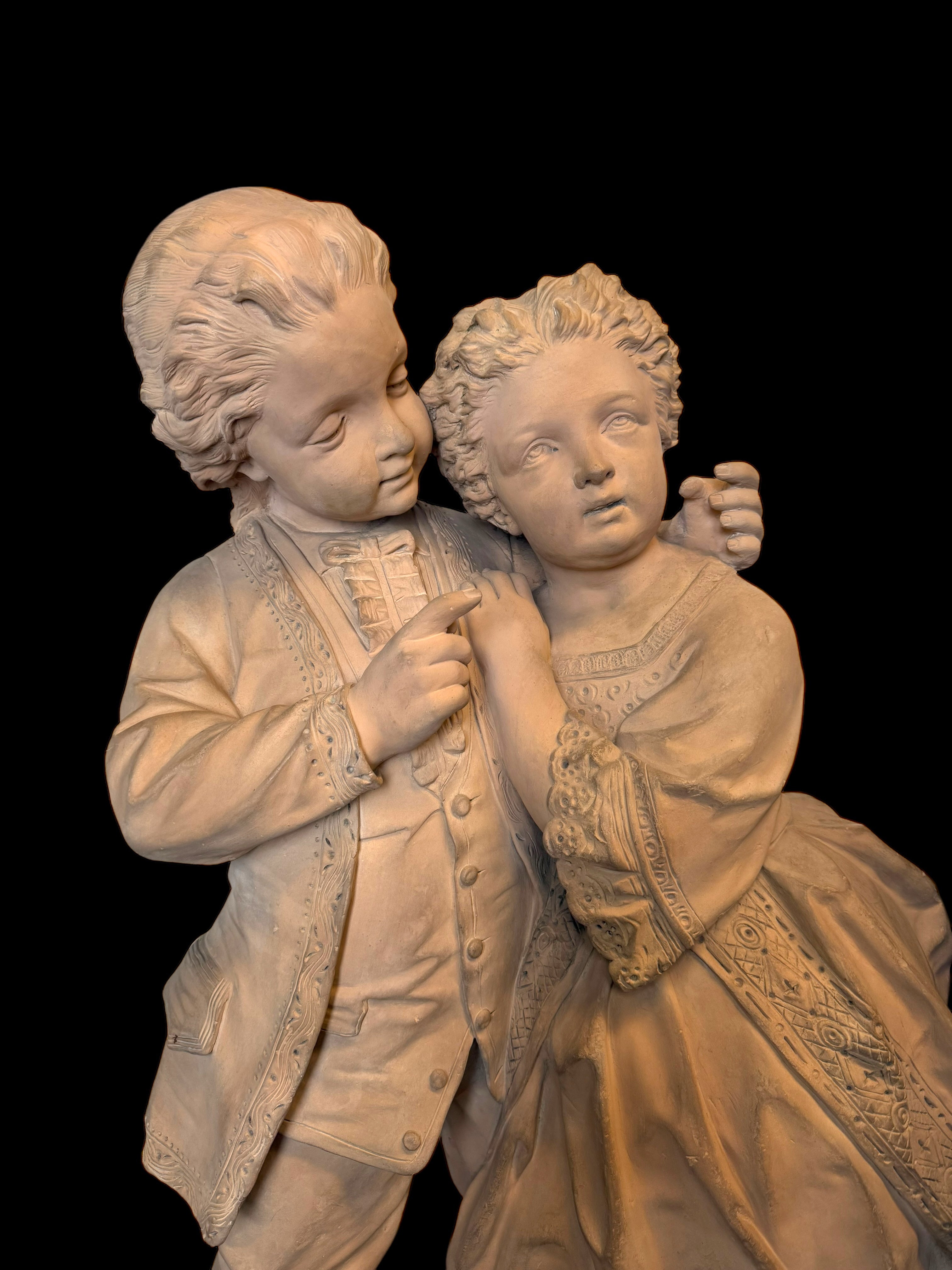 A Large 19th Century French Terra Cotta Sculpture Of A Loving Couple