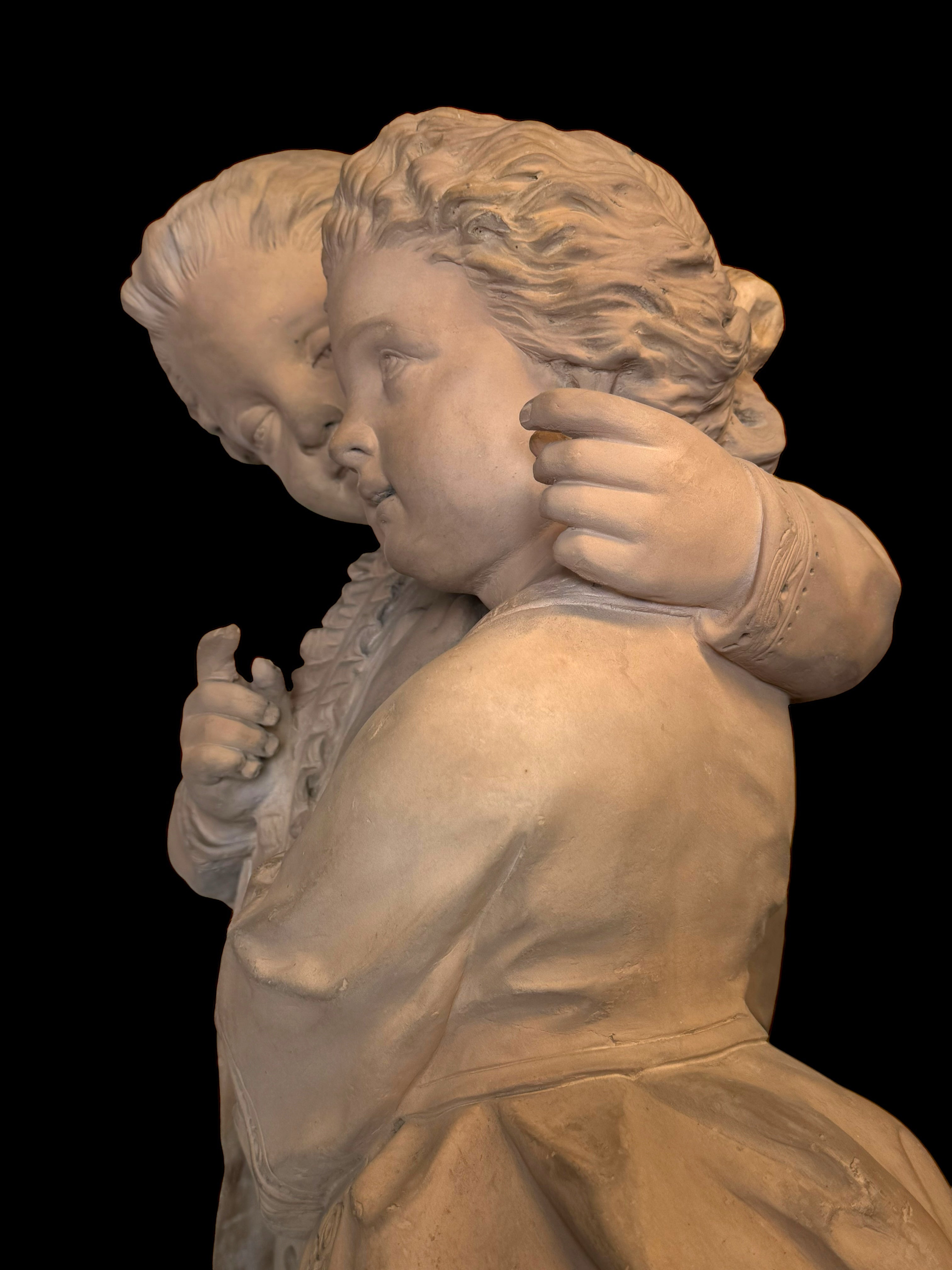 A Large 19th Century French Terra Cotta Sculpture Of A Loving Couple