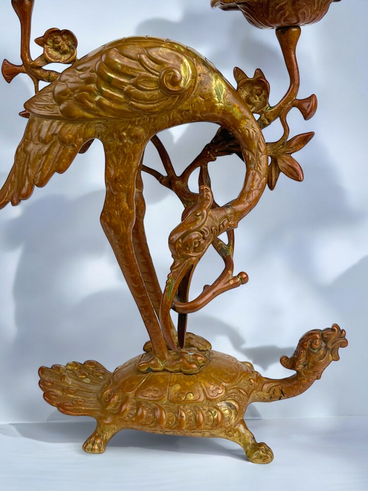 A Pair of French Chinoiserie Patinated Bronze Candle Sticks