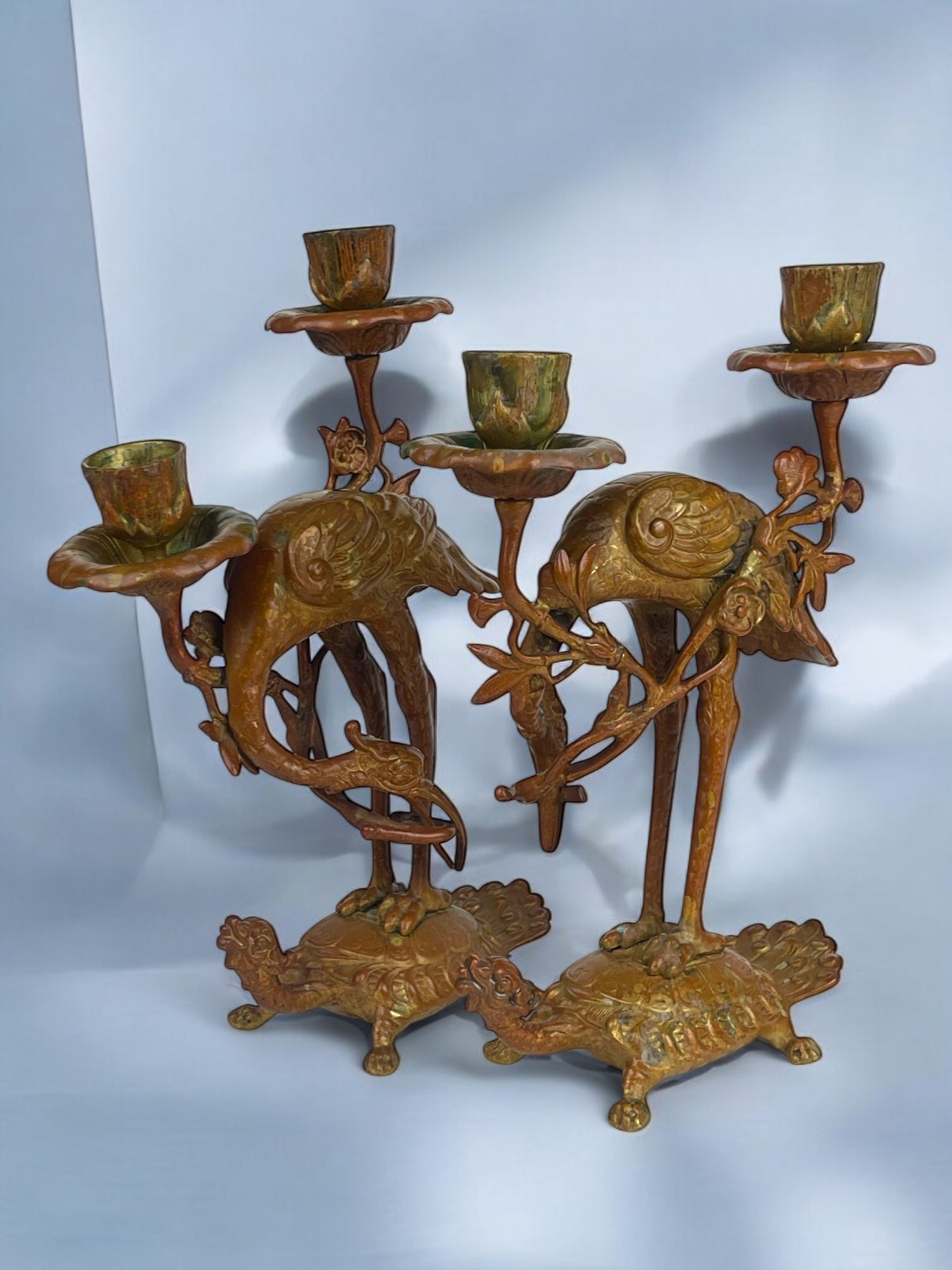 A Pair of French Chinoiserie Patinated Bronze Candle Sticks