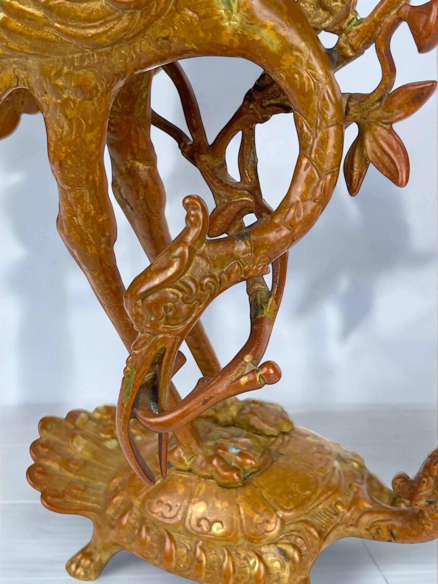 A Pair of French Chinoiserie Patinated Bronze Candle Sticks