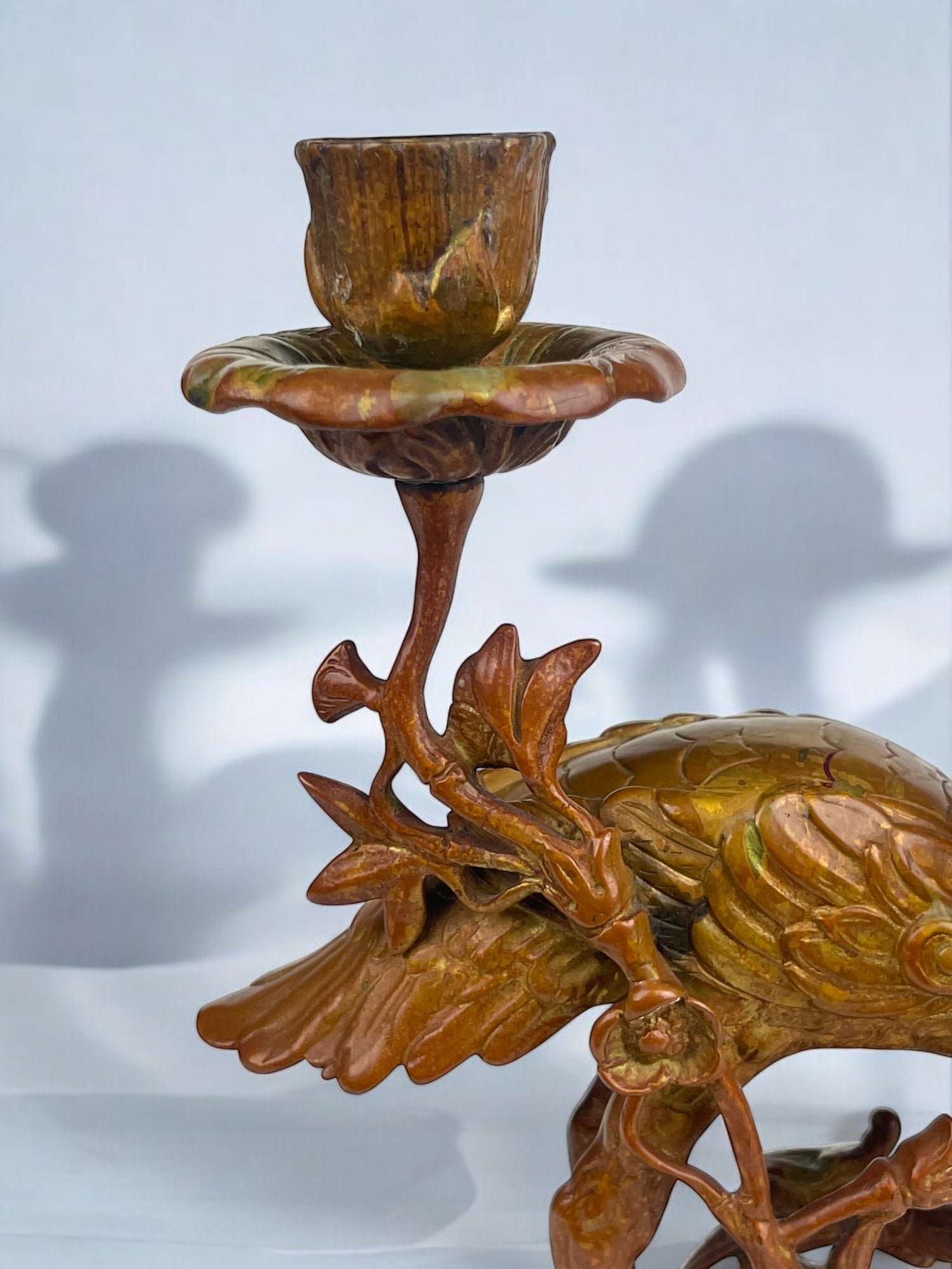 A Pair of French Chinoiserie Patinated Bronze Candle Sticks