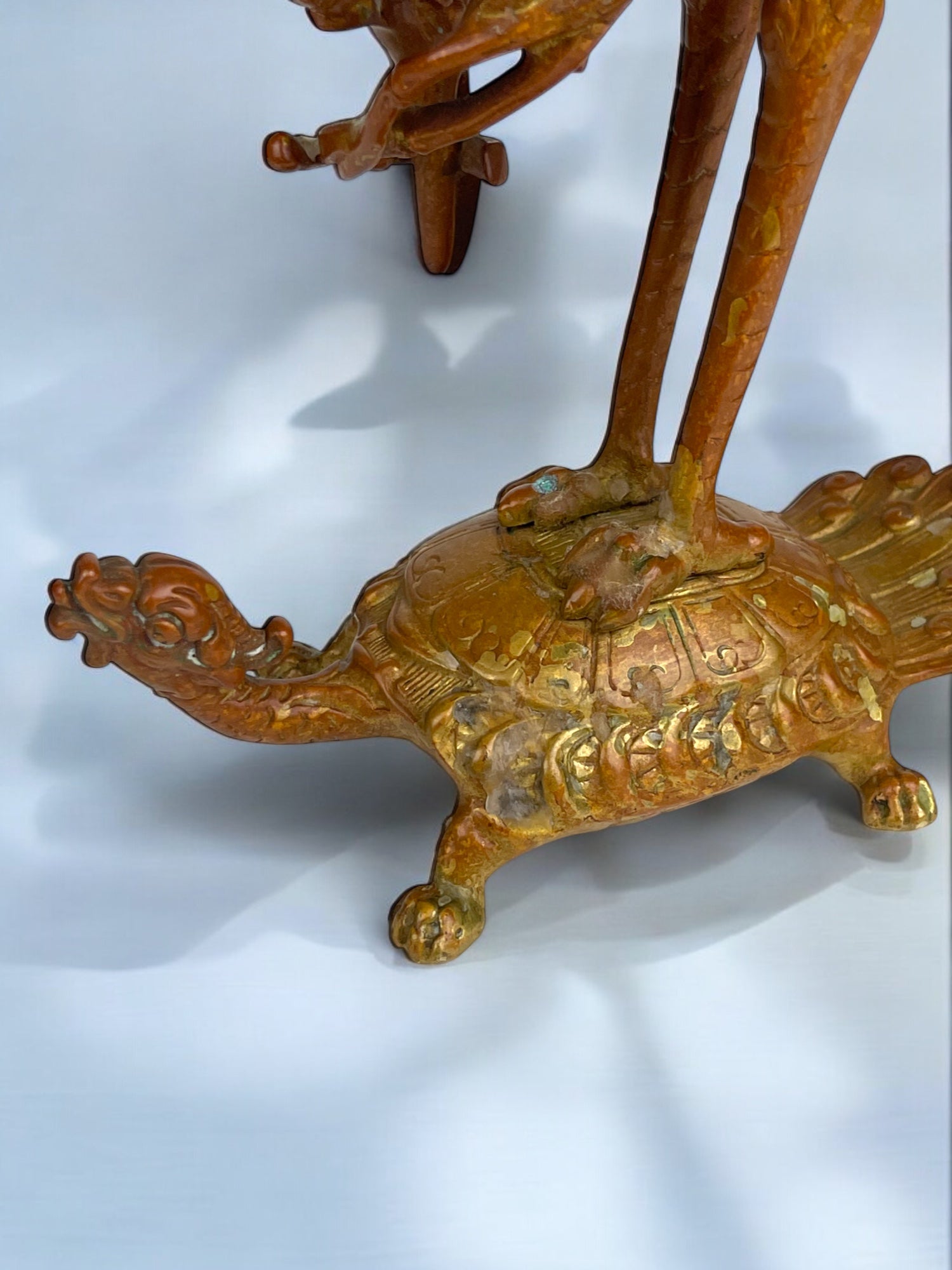 A Pair of French Chinoiserie Patinated Bronze Candle Sticks