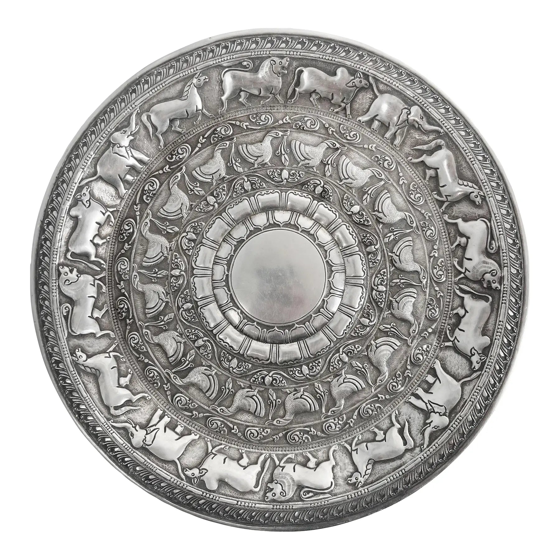 An Indian Silver Hand Made Chisiled Decorative Plate. India, 20th Century