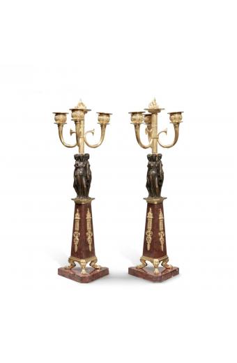 A Pair of Empire Patinated and Gilt Bronze and Rouge Griotte Marble Three-Light Candelabra, Circa 1815