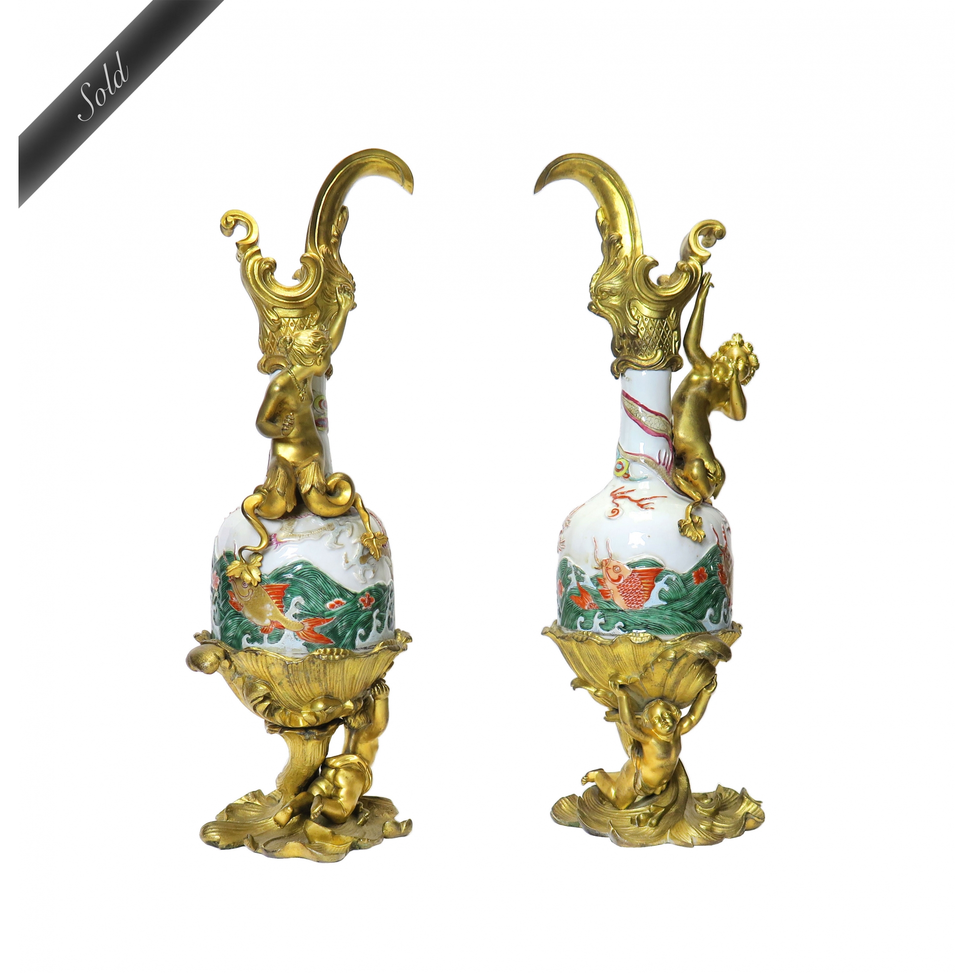 A Pair Of French Ormolu Mounted Chinese Porcelain Ewers